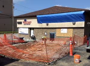 Drive thru lane demo with orange fencing