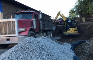 foundation prep for new addition at back of existing building