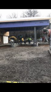Concrete being poured in the drive-thru