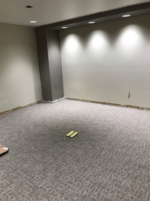 New board room with new carpeting and painted walls.